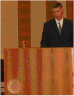 Мокоид перед трибуной оратора
